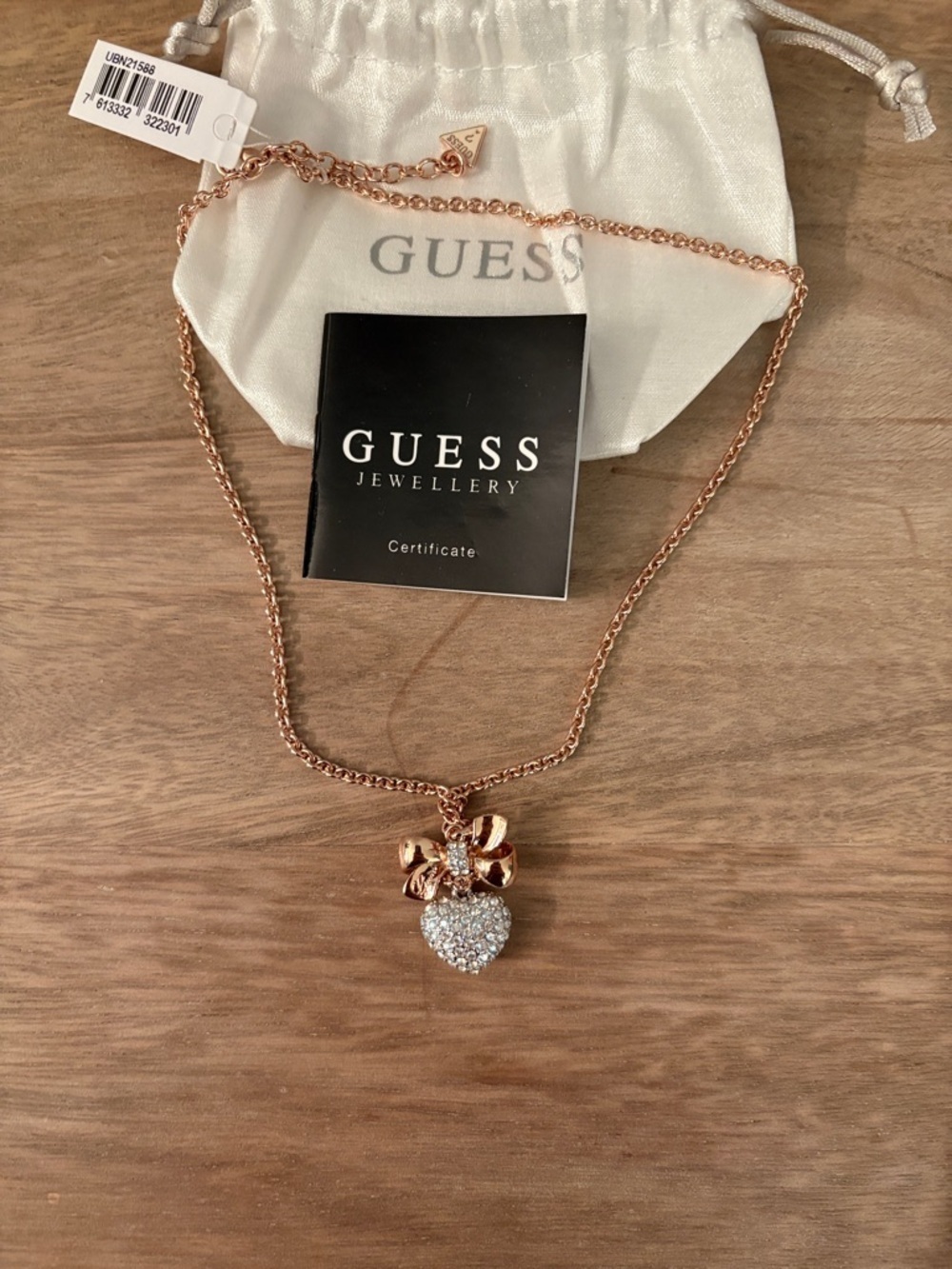 GUESS Rose Gold and silver Bow with Crystal Heart Pendant Necklace